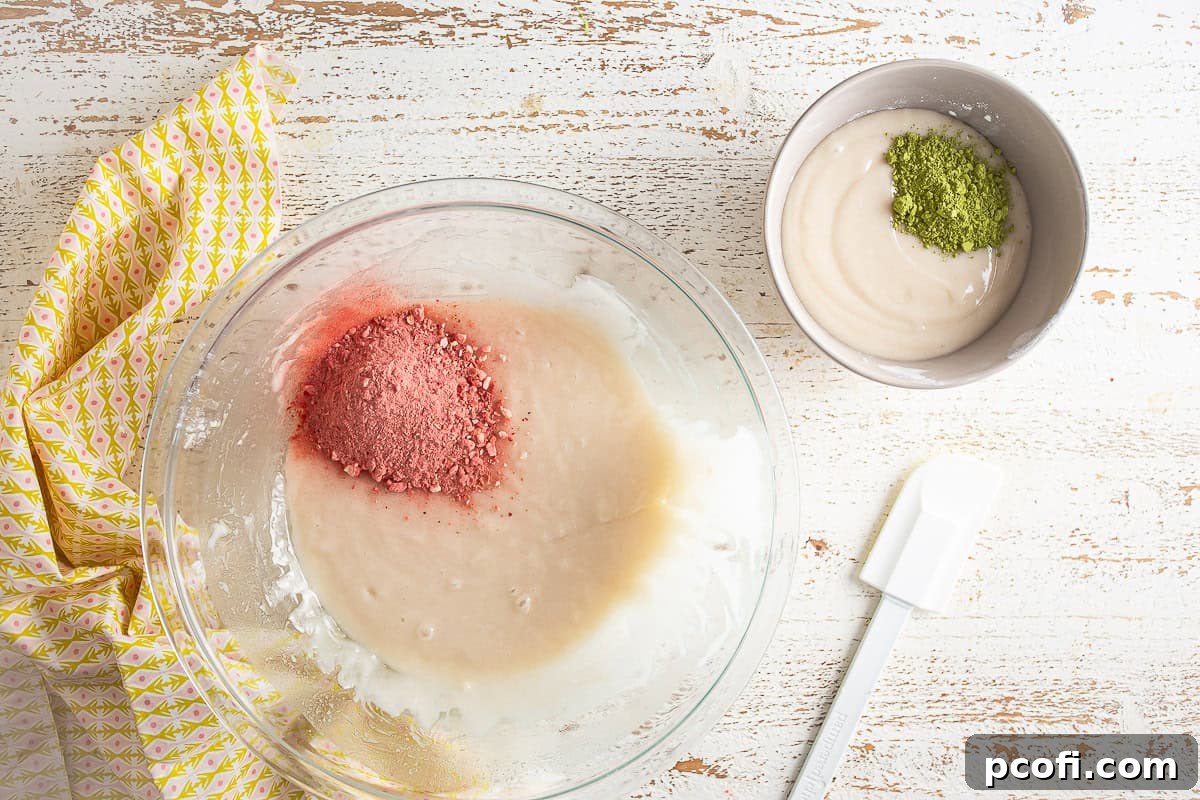 Dividing the loaf batter into two bowls to add strawberry and matcha flavors.