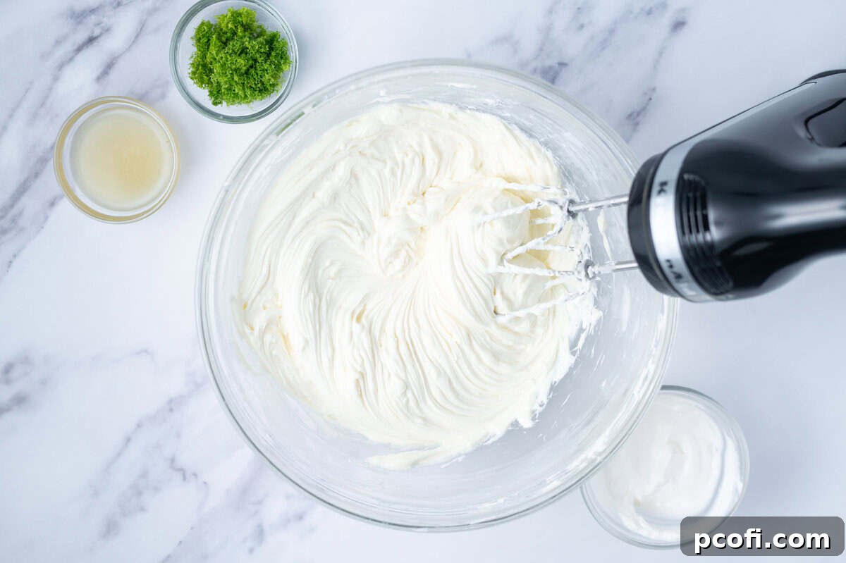 cream cheese beaten until creamy in a bowl with a hand mixer
