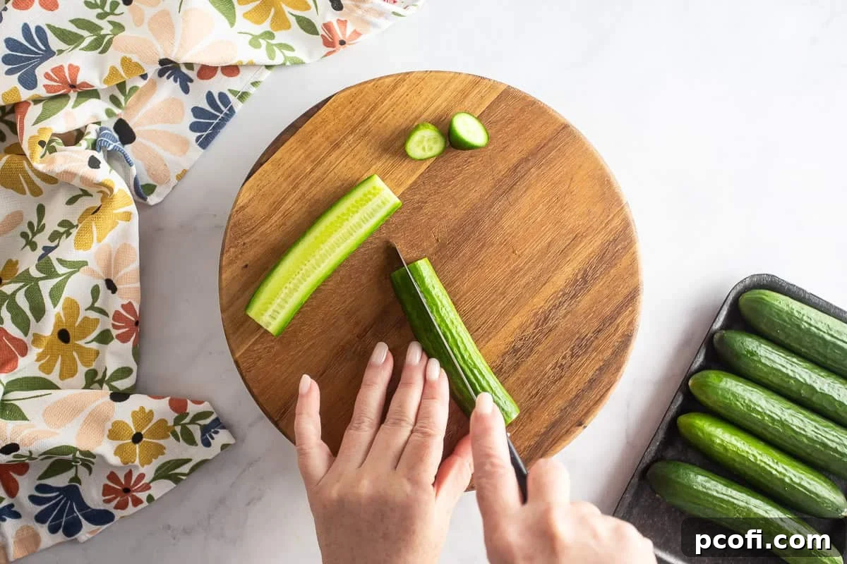 Homemade Dill Pickles: Crispy Refrigerator and Canning Recipes 4 Cutting cucumbers to prep for dill pickles.